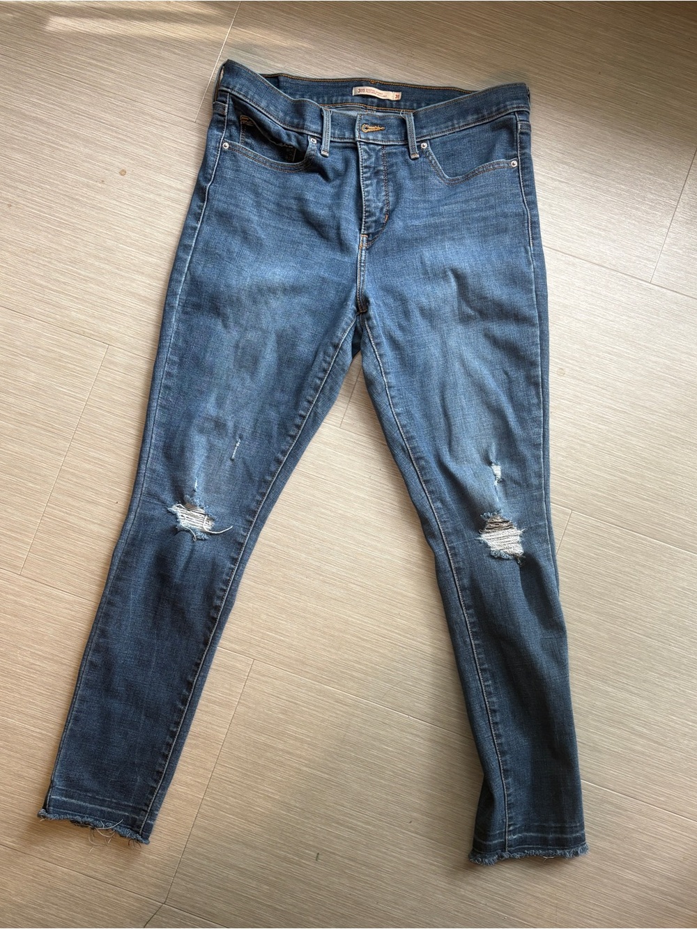 Levi's Mid-Dark Blue Distressed Skinny Jeans